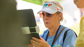 Woman completes the Liver Health Pledge on a tablet